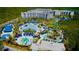 Aerial view of resort with pool and waterpark at 14501 Grove Resort Ave # 1332, Winter Garden, FL 34787