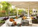 Outdoor patio with seating area and lush landscaping at 14501 Grove Resort Ave # 1332, Winter Garden, FL 34787