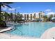 Large resort-style pool with plenty of seating at 14501 Grove Resort Ave # 1332, Winter Garden, FL 34787