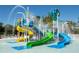 Colorful waterpark with slides and sprayers at 14501 Grove Resort Ave # 1332, Winter Garden, FL 34787