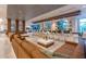 Relaxing lobby with comfortable seating and a stylish bar at 14501 Grove Resort Ave # 1332, Winter Garden, FL 34787