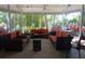 Covered outdoor lounge area with comfortable seating at 14501 Grove Resort Ave # 1332, Winter Garden, FL 34787