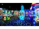 Brightly lit arcade with various games for all ages at 14501 Grove Resort Ave # 1332, Winter Garden, FL 34787