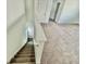 Modern staircase leading to the upper level of the home at 1652 Cross Prairie Pkwy, Kissimmee, FL 34744