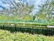 Well-maintained tennis courts surrounded by landscaping at 1652 Cross Prairie Pkwy, Kissimmee, FL 34744