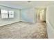 Spacious loft area with neutral carpeting at 1652 Cross Prairie Pkwy, Kissimmee, FL 34744