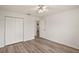 Bedroom with double doors leading to another room at 2788 Privada Dr, The Villages, FL 32162