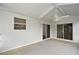 Sunroom with sliding doors and backyard access at 2788 Privada Dr, The Villages, FL 32162
