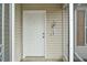 White front door with a welcome sign at 2788 Privada Dr, The Villages, FL 32162
