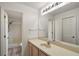 Bathroom with vanity, single sink, and shower at 2788 Privada Dr, The Villages, FL 32162