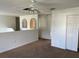 Spacious loft area with ceiling fan and carpet flooring at 3001 Mandolin Dr, Kissimmee, FL 34744
