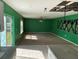 Large living room with green walls and ceiling fan at 3001 Mandolin Dr, Kissimmee, FL 34744
