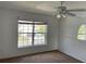 Bright bedroom with window overlooking the street at 3001 Mandolin Dr, Kissimmee, FL 34744