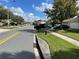 Quiet residential street with well-maintained homes and landscaping at 3001 Mandolin Dr, Kissimmee, FL 34744