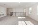 Spacious loft with carpet and multiple windows at 5648 Green Arrow Pl, Sanford, FL 32773