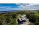 Aerial view of house under construction by the lake at 71 E Lake Shore Blvd, Kissimmee, FL 34744