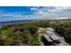 Aerial view of house under construction by the lake at 71 E Lake Shore Blvd, Kissimmee, FL 34744