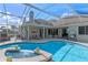 Relaxing pool area with spa and view of the home's exterior at 9810 Camberley Cir, Orlando, FL 32836