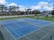 Well-maintained community tennis courts at 9810 Camberley Cir, Orlando, FL 32836