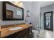 Clean bathroom with granite countertop, single vanity, and shower at 9810 Camberley Cir, Orlando, FL 32836