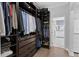 Large walk-in closet with ample shelving and hanging space at 9810 Camberley Cir, Orlando, FL 32836