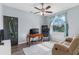 Home office with a desk, treadmill, and comfortable seating at 9810 Camberley Cir, Orlando, FL 32836