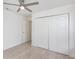 Well-lit bedroom with large closet and ceiling fan at 1902 Normandy, Deltona, FL 32725