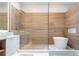 Modern bathroom with frameless glass shower and soaking tub at 5646 Masters Blvd, Orlando, FL 32819