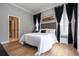 Bedroom with a comfortable bed and ensuite bathroom at 5646 Masters Blvd, Orlando, FL 32819