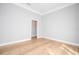 Light and airy bedroom with hardwood flooring at 5646 Masters Blvd, Orlando, FL 32819
