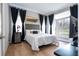 Bedroom with a comfortable bed and bay window at 5646 Masters Blvd, Orlando, FL 32819