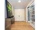 Elegant entryway with double doors and hardwood floor at 5646 Masters Blvd, Orlando, FL 32819