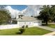 House's side view, showing garage and pool at 5646 Masters Blvd, Orlando, FL 32819