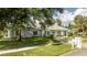 House's front view with lush landscaping and mailbox at 5646 Masters Blvd, Orlando, FL 32819