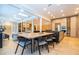 Open concept kitchen with a large island and modern design at 5646 Masters Blvd, Orlando, FL 32819
