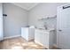 Well-equipped laundry room with new appliances at 5646 Masters Blvd, Orlando, FL 32819