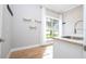 Laundry room with washer, dryer, and utility sink at 5646 Masters Blvd, Orlando, FL 32819