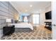 Spacious main bedroom with large windows and sitting area at 5646 Masters Blvd, Orlando, FL 32819