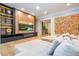 Modern media room with built-in shelving and large TV at 5646 Masters Blvd, Orlando, FL 32819