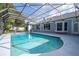Large screened pool and surrounding patio at 5646 Masters Blvd, Orlando, FL 32819