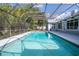 Spacious screened-in pool with ample deck space at 5646 Masters Blvd, Orlando, FL 32819