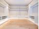 Large walk-in closet with built-in shelving and drawers at 5646 Masters Blvd, Orlando, FL 32819