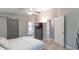 Main bedroom with a dresser and access to the bathroom at 821 Pine Shores Cir, New Smyrna Beach, FL 32168