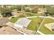 Aerial view showcasing a house with a pool and a large backyard at 161 Laurel Way, Kissimmee, FL 34743