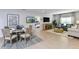 Bright dining area with a round table and modern chairs at 638 Teviot Rd, Haines City, FL 33844