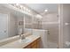 Modern bathroom with walk-in shower and updated fixtures at 806 Knightsbridge Cir, Davenport, FL 33896