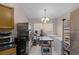 Well-equipped kitchen featuring stainless steel appliances and ample counter space at 806 Knightsbridge Cir, Davenport, FL 33896