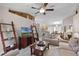 Spacious living room with comfortable seating and a large TV at 806 Knightsbridge Cir, Davenport, FL 33896