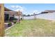 Large backyard with patio and shade sail at 806 Knightsbridge Cir, Davenport, FL 33896