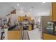 Modern kitchen with stainless steel appliances and granite countertops at 806 Knightsbridge Cir, Davenport, FL 33896